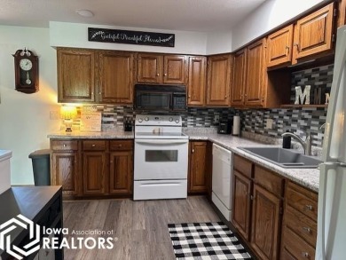 This charming 2 bedroom, 2 1/2 bath upper level condo offers the on Garner Golf and Country Club in Iowa - for sale on GolfHomes.com, golf home, golf lot