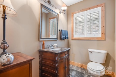 Enjoy a direct view of Big Bald Mountain from this spotless on Wolf Laurel Country Club in North Carolina - for sale on GolfHomes.com, golf home, golf lot