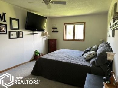 This charming 2 bedroom, 2 1/2 bath upper level condo offers the on Garner Golf and Country Club in Iowa - for sale on GolfHomes.com, golf home, golf lot