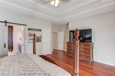 Welcome home to this inviting 4-bedroom, 2.5-bath beauty located on Hamilton Mill Golf Club in Georgia - for sale on GolfHomes.com, golf home, golf lot