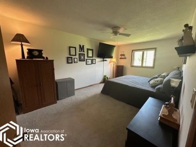 This charming 2 bedroom, 2 1/2 bath upper level condo offers the on Garner Golf and Country Club in Iowa - for sale on GolfHomes.com, golf home, golf lot