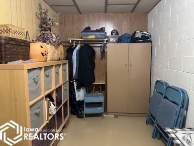 This charming 2 bedroom, 2 1/2 bath upper level condo offers the on Garner Golf and Country Club in Iowa - for sale on GolfHomes.com, golf home, golf lot