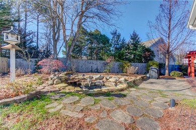 Welcome home to this inviting 4-bedroom, 2.5-bath beauty located on Hamilton Mill Golf Club in Georgia - for sale on GolfHomes.com, golf home, golf lot