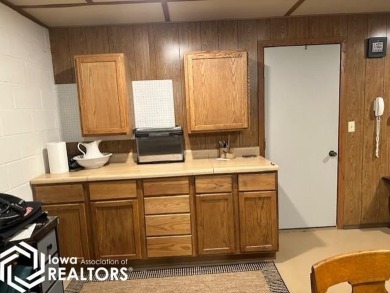 This charming 2 bedroom, 2 1/2 bath upper level condo offers the on Garner Golf and Country Club in Iowa - for sale on GolfHomes.com, golf home, golf lot