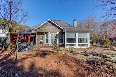 Welcome home to this inviting 4-bedroom, 2.5-bath beauty located on Hamilton Mill Golf Club in Georgia - for sale on GolfHomes.com, golf home, golf lot