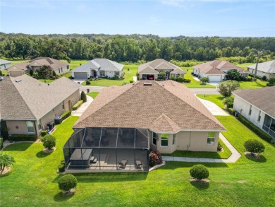 As you step into this luxurious golf course home overlooking the on Huntington Hills Golf and Country Club in Florida - for sale on GolfHomes.com, golf home, golf lot