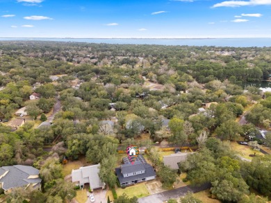 Practically Perfect! This Bluewater Bay beauty checks ALL the on Fairway Oaks at Magnolia Golf Course in Florida - for sale on GolfHomes.com, golf home, golf lot