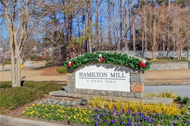 Welcome home to this inviting 4-bedroom, 2.5-bath beauty located on Hamilton Mill Golf Club in Georgia - for sale on GolfHomes.com, golf home, golf lot