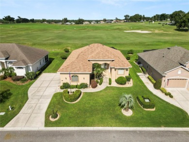 As you step into this luxurious golf course home overlooking the on Huntington Hills Golf and Country Club in Florida - for sale on GolfHomes.com, golf home, golf lot