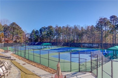 Welcome home to this inviting 4-bedroom, 2.5-bath beauty located on Hamilton Mill Golf Club in Georgia - for sale on GolfHomes.com, golf home, golf lot