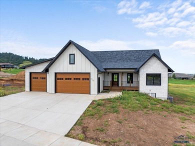 Discover unparalleled luxury in this stunning new construction on Elkhorn Ridge Golf Course in South Dakota - for sale on GolfHomes.com, golf home, golf lot