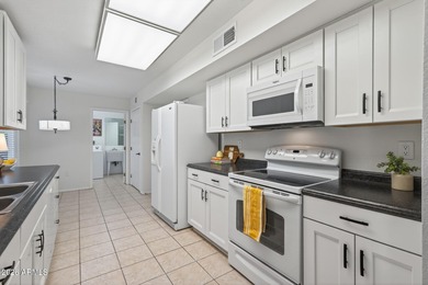 Expanded & beautifully refreshed, this desirable Sun City West on Grandview Golf Course in Arizona - for sale on GolfHomes.com, golf home, golf lot