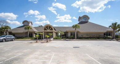 Beautiful naturally treed home site backing up to Leopard's on Ocean Ridge Plantation in North Carolina - for sale on GolfHomes.com, golf home, golf lot