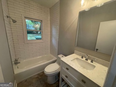 Beautifully renovated bungalow in the highly sought after on John A. White Golf Course in Georgia - for sale on GolfHomes.com, golf home, golf lot