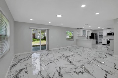 Discover this beautifully renovated 4-bedroom, 3-bath,  dream on Temple Terrace Golf and Country Club in Florida - for sale on GolfHomes.com, golf home, golf lot