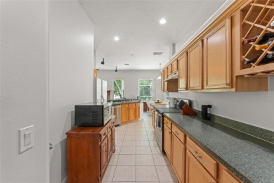 **This house comes with a REDUCED RATE through the seller's on Oaks National Golf Course in Florida - for sale on GolfHomes.com, golf home, golf lot