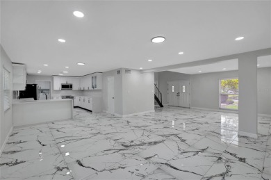 Discover this beautifully renovated 4-bedroom, 3-bath,  dream on Temple Terrace Golf and Country Club in Florida - for sale on GolfHomes.com, golf home, golf lot