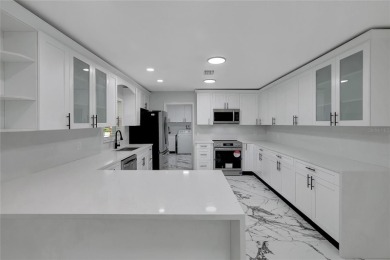 Discover this beautifully renovated 4-bedroom, 3-bath,  dream on Temple Terrace Golf and Country Club in Florida - for sale on GolfHomes.com, golf home, golf lot