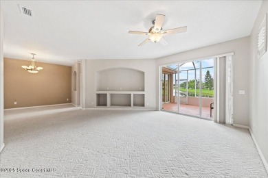 Live the good life in this upscale lakefront villa in Viera on Viera East Golf Club in Florida - for sale on GolfHomes.com, golf home, golf lot
