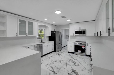 Discover this beautifully renovated 4-bedroom, 3-bath,  dream on Temple Terrace Golf and Country Club in Florida - for sale on GolfHomes.com, golf home, golf lot