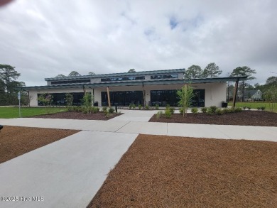 Beautiful naturally treed home site backing up to Leopard's on Ocean Ridge Plantation in North Carolina - for sale on GolfHomes.com, golf home, golf lot