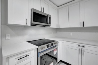 Discover this beautifully renovated 4-bedroom, 3-bath,  dream on Temple Terrace Golf and Country Club in Florida - for sale on GolfHomes.com, golf home, golf lot