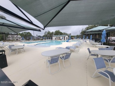 Beautiful naturally treed home site backing up to Leopard's on Ocean Ridge Plantation in North Carolina - for sale on GolfHomes.com, golf home, golf lot