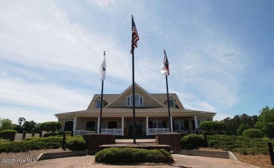 Beautiful naturally treed home site backing up to Leopard's on Ocean Ridge Plantation in North Carolina - for sale on GolfHomes.com, golf home, golf lot