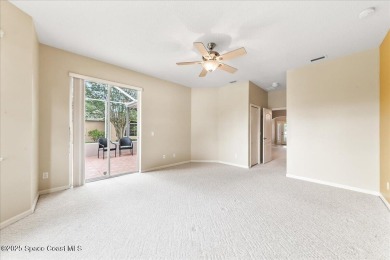 Live the good life in this upscale lakefront villa in Viera on Viera East Golf Club in Florida - for sale on GolfHomes.com, golf home, golf lot