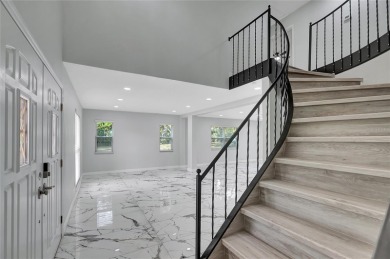 Discover this beautifully renovated 4-bedroom, 3-bath,  dream on Temple Terrace Golf and Country Club in Florida - for sale on GolfHomes.com, golf home, golf lot