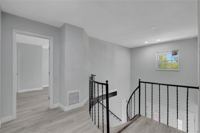 Discover this beautifully renovated 4-bedroom, 3-bath,  dream on Temple Terrace Golf and Country Club in Florida - for sale on GolfHomes.com, golf home, golf lot