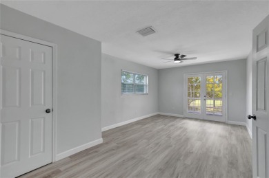 Discover this beautifully renovated 4-bedroom, 3-bath,  dream on Temple Terrace Golf and Country Club in Florida - for sale on GolfHomes.com, golf home, golf lot