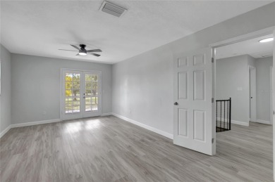 Discover this beautifully renovated 4-bedroom, 3-bath,  dream on Temple Terrace Golf and Country Club in Florida - for sale on GolfHomes.com, golf home, golf lot