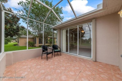Live the good life in this upscale lakefront villa in Viera on Viera East Golf Club in Florida - for sale on GolfHomes.com, golf home, golf lot