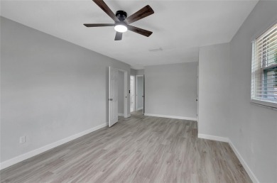 Discover this beautifully renovated 4-bedroom, 3-bath,  dream on Temple Terrace Golf and Country Club in Florida - for sale on GolfHomes.com, golf home, golf lot