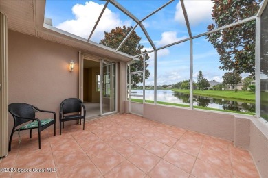 Live the good life in this upscale lakefront villa in Viera on Viera East Golf Club in Florida - for sale on GolfHomes.com, golf home, golf lot