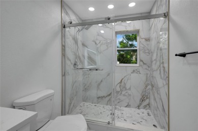 Discover this beautifully renovated 4-bedroom, 3-bath,  dream on Temple Terrace Golf and Country Club in Florida - for sale on GolfHomes.com, golf home, golf lot