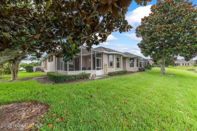 Live the good life in this upscale lakefront villa in Viera on Viera East Golf Club in Florida - for sale on GolfHomes.com, golf home, golf lot