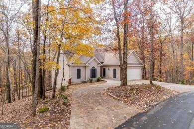 Nestled on a large, private, wooded lot in the serene Bent Tree on Bent Tree Golf Course in Georgia - for sale on GolfHomes.com, golf home, golf lot