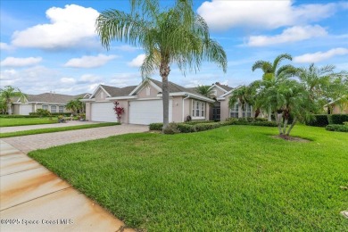 Live the good life in this upscale lakefront villa in Viera on Viera East Golf Club in Florida - for sale on GolfHomes.com, golf home, golf lot