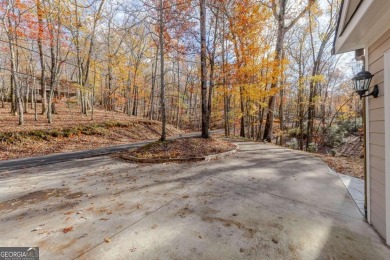 Nestled on a large, private, wooded lot in the serene Bent Tree on Bent Tree Golf Course in Georgia - for sale on GolfHomes.com, golf home, golf lot