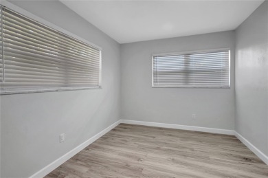 Discover this beautifully renovated 4-bedroom, 3-bath,  dream on Temple Terrace Golf and Country Club in Florida - for sale on GolfHomes.com, golf home, golf lot