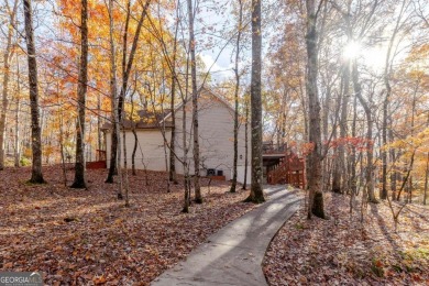 Nestled on a large, private, wooded lot in the serene Bent Tree on Bent Tree Golf Course in Georgia - for sale on GolfHomes.com, golf home, golf lot