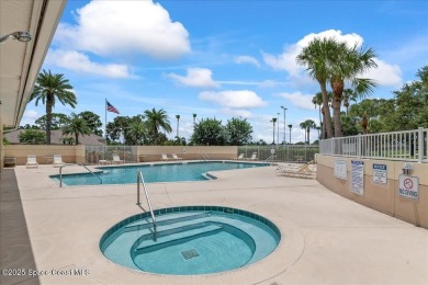 Live the good life in this upscale lakefront villa in Viera on Viera East Golf Club in Florida - for sale on GolfHomes.com, golf home, golf lot