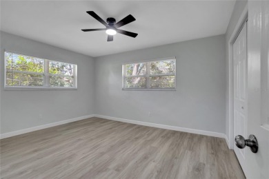 Discover this beautifully renovated 4-bedroom, 3-bath,  dream on Temple Terrace Golf and Country Club in Florida - for sale on GolfHomes.com, golf home, golf lot