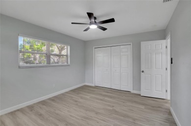 Discover this beautifully renovated 4-bedroom, 3-bath,  dream on Temple Terrace Golf and Country Club in Florida - for sale on GolfHomes.com, golf home, golf lot