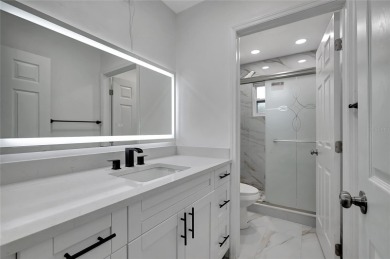 Discover this beautifully renovated 4-bedroom, 3-bath,  dream on Temple Terrace Golf and Country Club in Florida - for sale on GolfHomes.com, golf home, golf lot