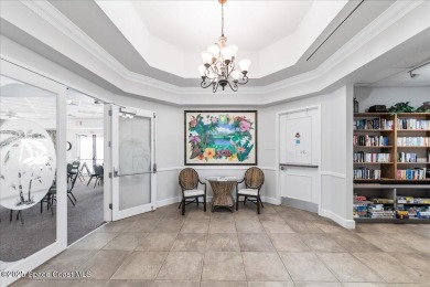 Live the good life in this upscale lakefront villa in Viera on Viera East Golf Club in Florida - for sale on GolfHomes.com, golf home, golf lot