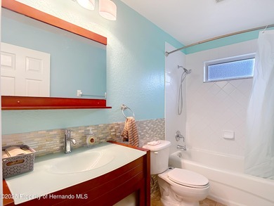 ONE OR MORE PHOTOS VIRTUALLY STAGED! Welcome to your dream home on Heritage Harbor Golf and Country Club in Florida - for sale on GolfHomes.com, golf home, golf lot