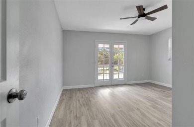 Discover this beautifully renovated 4-bedroom, 3-bath,  dream on Temple Terrace Golf and Country Club in Florida - for sale on GolfHomes.com, golf home, golf lot